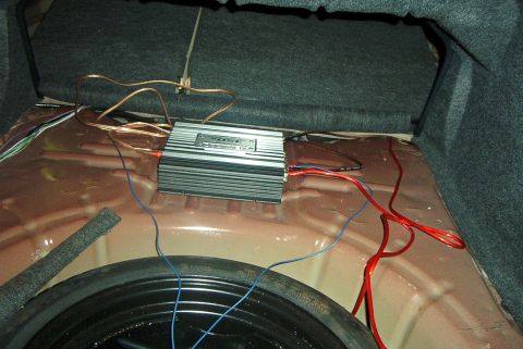 2001 Ford Taurus - The amp all wired, waiting to be mounted on the sub box.