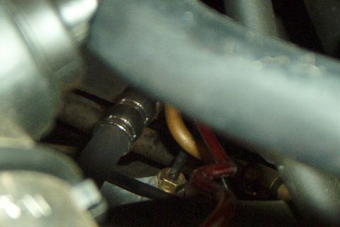 2001 Ford Taurus - Engine side of the power cable passthru.