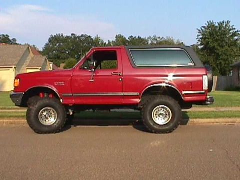1989 Ford Bronco - bright red look w/ lift