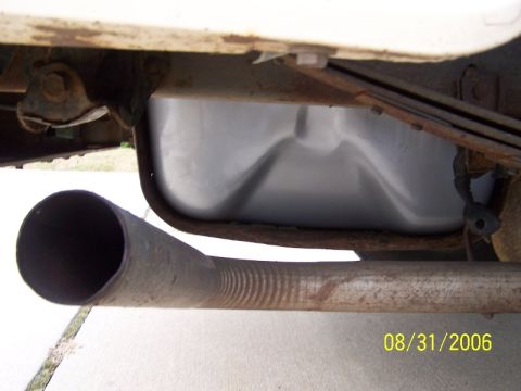 1992 Ford Bronco - Underside view of a vehicle's exhaust pipe and fuel tank, with a date stamp of 08/31/2006.