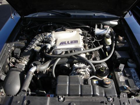 1992 Ford Crown Victoria - The engine bay shows a "ALLEN" supercharger and various hoses and components.