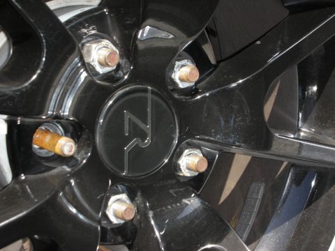 1992 Ford Crown Victoria - Black alloy wheel center cap with 'ZR' logo and visible lug nuts.