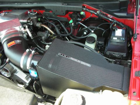 1992 Ford Crown Victoria - Close-up of an engine bay an aftermarket cold air intake system.