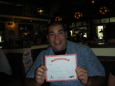 1992 Ford Crown Victoria - Man proudly displays his drawing from Chili's restaurant.