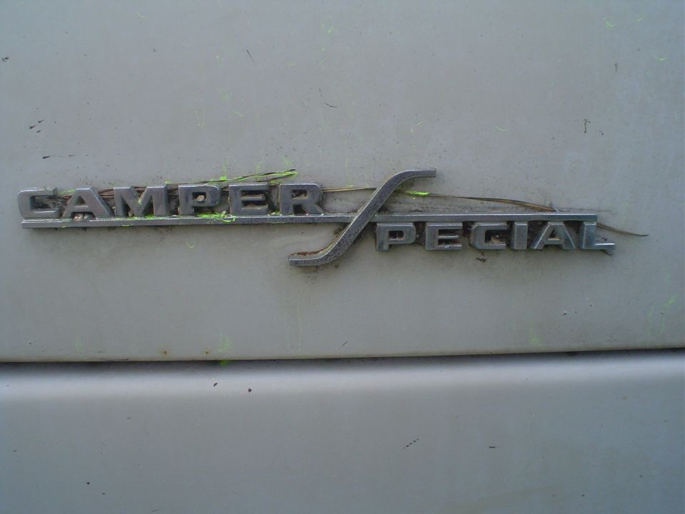 Chrome Camper Special emblem on a light-colored vehicle body