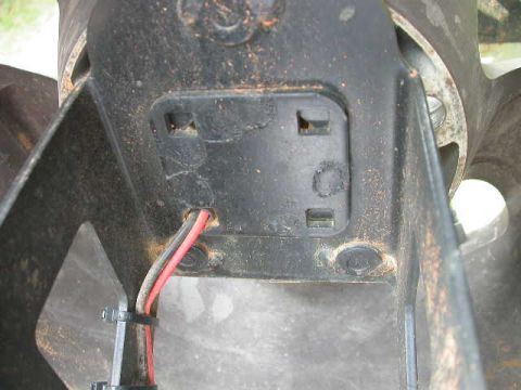 1990 Ford Bronco - This image shows a close-up of an electrical connector and wiring harness, not a vehicle part.