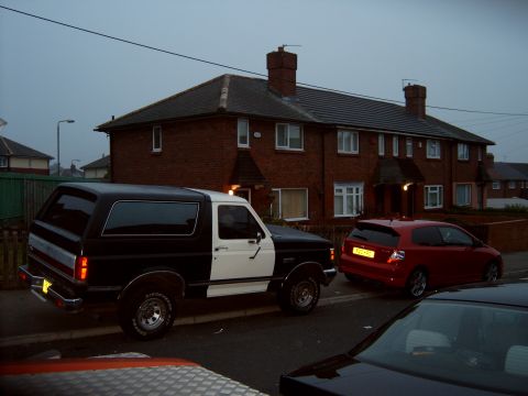 1989 Ford Bronco - my truck dwarfing my friends civic