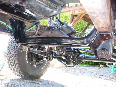 1978 Ford Bronco - Undercarriage view of a 1978 Ford Bronco, focusing on the Dana 60 axle and suspension.
