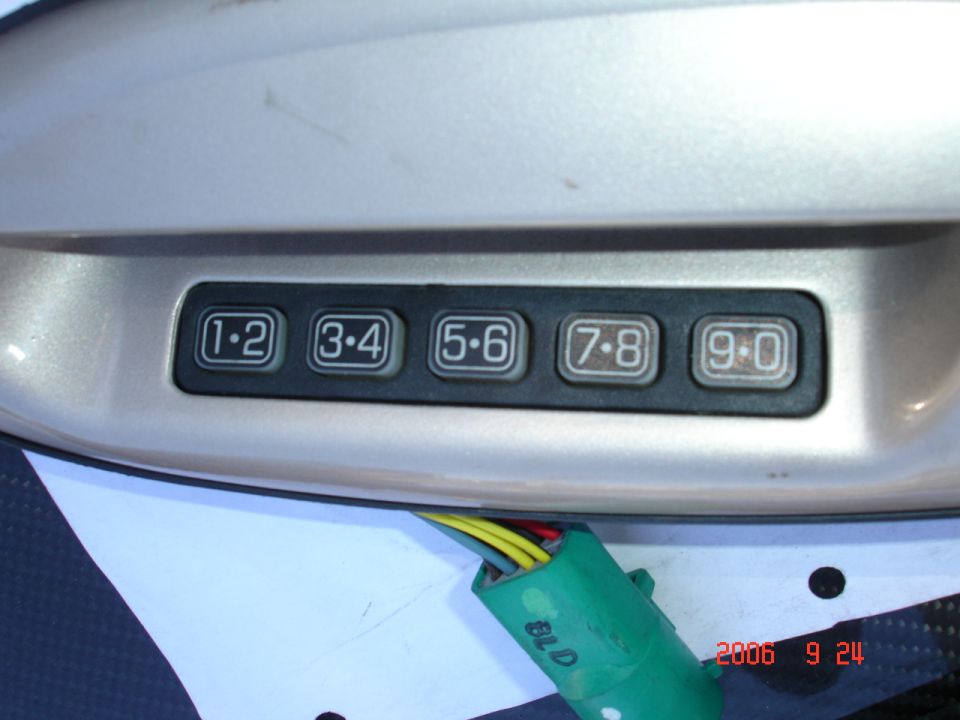 Door keypad with numbers 1-2, 3-4, 5-6, 7-8, 9-0