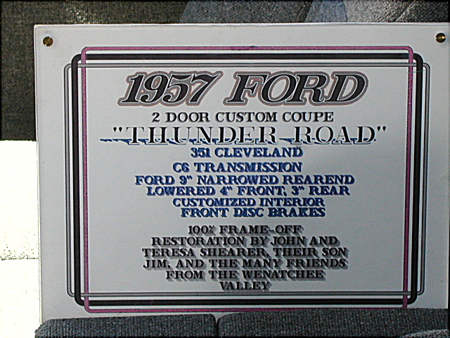 Car show display board for a 1957 Ford Custom coupe 'Thunder Road' listing specs