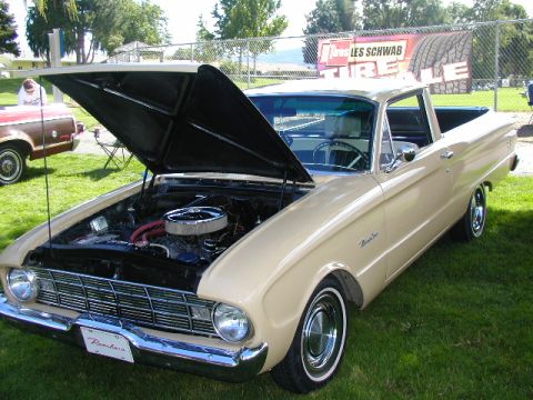 1967 Ford Ranchero - A tan 1960 Ford Falcon Ranchero is displayed with its hood up at an outdoor event.