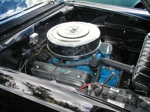 1967 Ford Ranchero - Engine bay of a 1967 Ford Ranchero, showing the V8 engine and associated components.