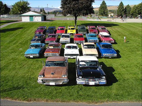 1967 Ford Ranchero - A collection of classic Ford vehicles, including two 1958 Fairlanes, are displayed on a sunny day.