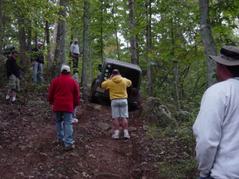 1991 Ford Bronco - Yes, that's his rear left coil spring. Rolled about 20' down the trail before someone caught it. As Ron White would say, "It fell out. It f…