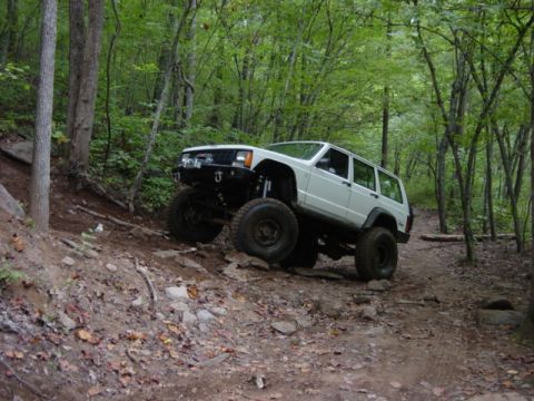1991 Ford Bronco - Hanging a right onto the rocks on 2.