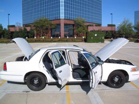 1998 Ford Crown Victoria - This 1998 Ford Crown Victoria is shown with all doors and the hood open, revealing its interior and engine bay.
