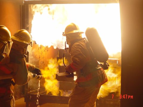 1981 Ford Bronco - Firefighters practice their skills in a controlled burn environment.