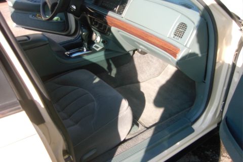 1996 Mercury Grand Marquis - Interior view of a car, showing the seats, dashboard, and center console.