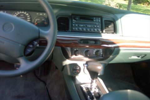 1996 Mercury Grand Marquis - Interior view of a 1996 Mercury Grand Marquis, highlighting the dashboard and center console details.