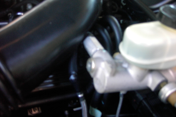 ABS+TRAC brake line collsion w/ 04 CVPI tube.

I tried to wrap with wire loom and electrical tape as factory lookign as possible