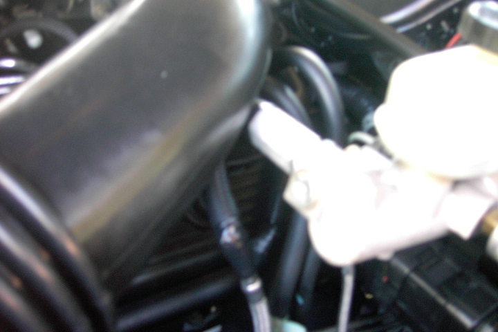ABS+TRAC brake line collsion w/ 04 CVPI tube.

I tried to wrap with wire loom and electrical tape as factory lookign as possible