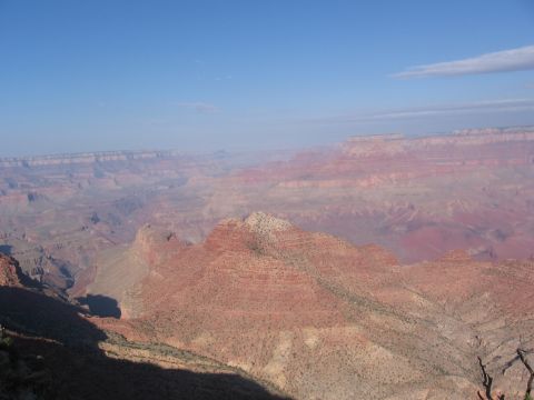 1995 Ford Probe - View of the Grand Canyon's vast geological layers and distant haze.