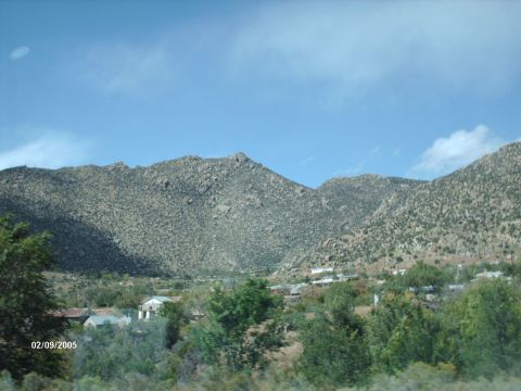 1995 Ford Probe - A scenic view of a mountainous region with scattered houses and lush greenery, captured on February 9, 2005.