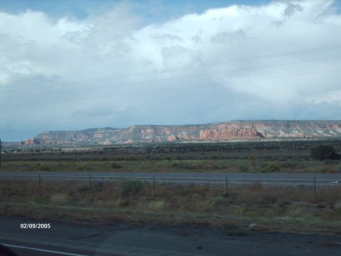 1995 Ford Probe - A scenic view of desert mesas and a highway, captured on February 9, 2005.