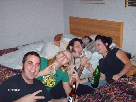 1995 Ford Probe - A group of friends are relaxing in a hotel room, with a date stamp visible in the corner.