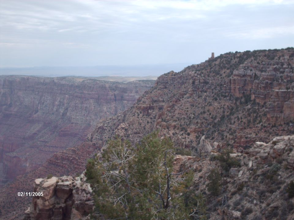 Grand Canyon landscape with a distant tower on a ridge, dated 02/11/2005