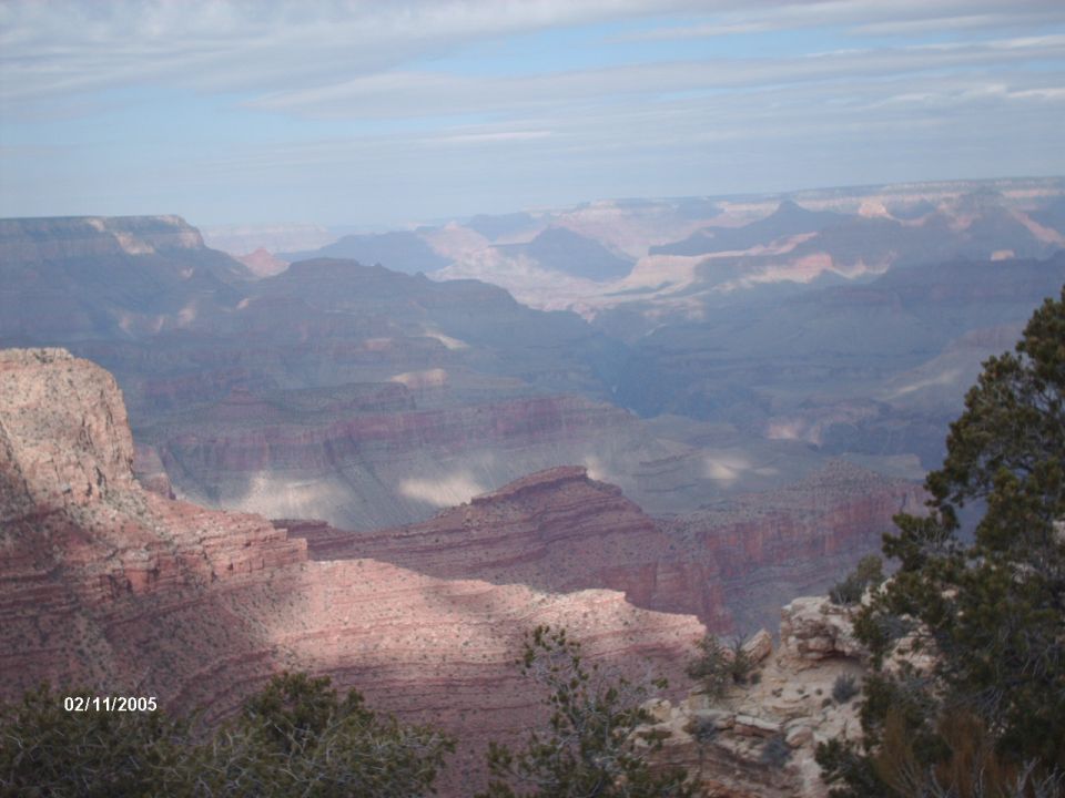 Grand Canyon landscape with date stamp 02/11/2005 and Supermotors.net logo