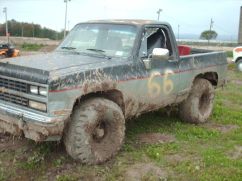 1991 Chevrolet Blazer - This mud-covered 1991 Chevrolet Blazer, marked with the number 66, is seen from a 3q-front angle.