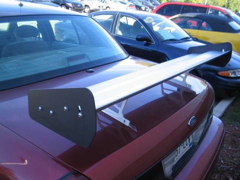 2001 Ford Crown Victoria - Rear view of a 2001 Ford Crown Victoria a prominent aftermarket spoiler.