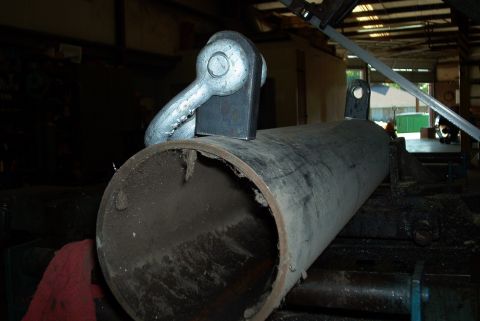 1983 Ford Bronco - A heavy-duty metal pipe is shown with a large tow hook assembly attached.