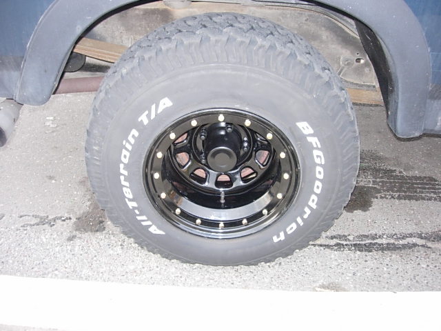 BFGoodrich All-Terrain T/A tire on black beadlock wheel