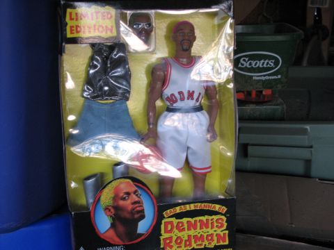 1991 Ford Bronco - Dennis Rodman action figure in its original packaging, including clothing and accessories.