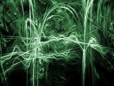 1990 Ford Bronco - Abstract green light trails overlayed with SUPERMOTORS.NET text.