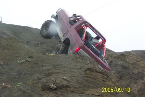 1995 Ford Bronco - This 1995 Ford Bronco is navigating a steep, rocky incline.