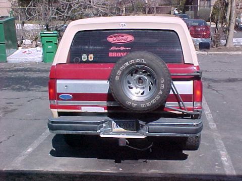 1990 Ford Bronco - Rear view of a 1990 Ford Bronco, a spare tire mounted externally.