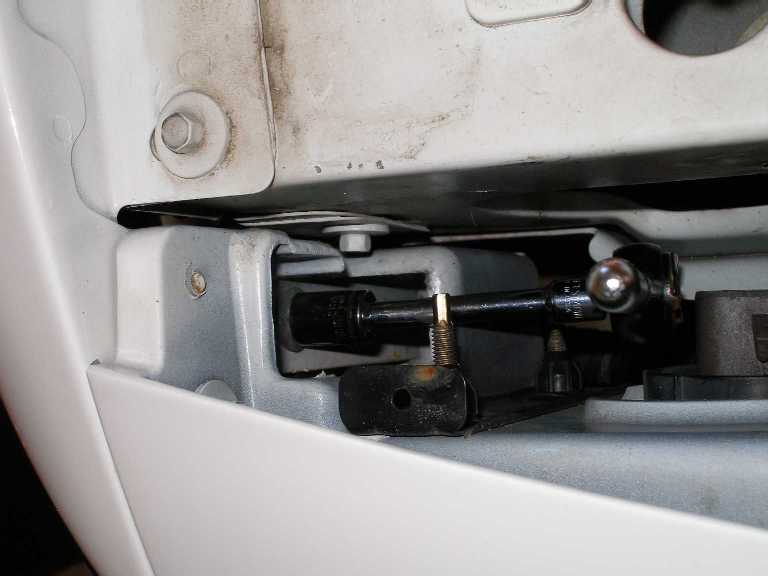 First, the corner lamp must be removed. There is a nut, under the trim panel, that runs along the radiator support, that must be removed.