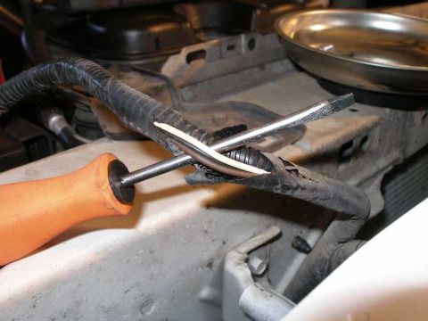 2001 Ford Crown Victoria - I used a knife to peel back the wiring loom to gain access to the correct turn signal wire.
