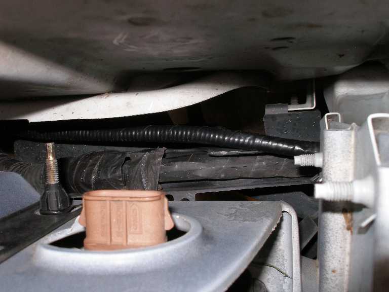The new wiring, passing by the turn signal connector.