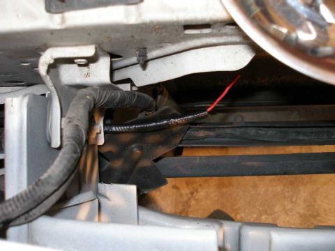 2001 Ford Crown Victoria - The factory turn signal wiring can be seen in the lefthand corner of the picture. The new wiring is the red wire.