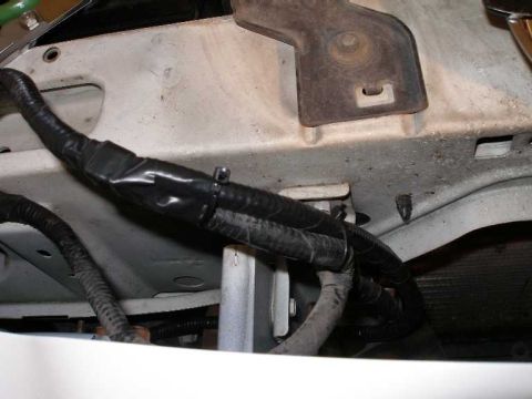 2001 Ford Crown Victoria - The new wiring, spliced into the turn signal wiring, wrapped up with electrical tape and secured with zip ties.