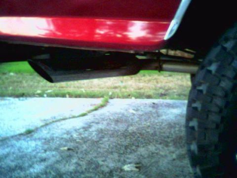 1992 Ford F-150 - The exhuast flows back from a single in/dual out Flowmaster 40 and exits at a 45* angle in front of the bumper on each side.