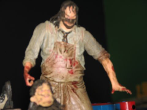 1991 Ford Bronco - A figure resembling Leatherface from The Texas Chainsaw Massacre is depicted in a photo with a Supermotors.net watermark.
