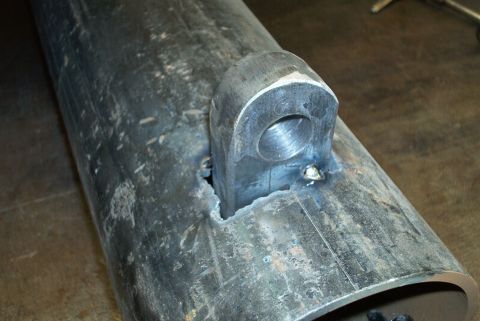 1983 Ford Bronco - Close-up view of a tow hook welded onto a metal tube, possibly a component for a vehicle's brushguard or bumper.