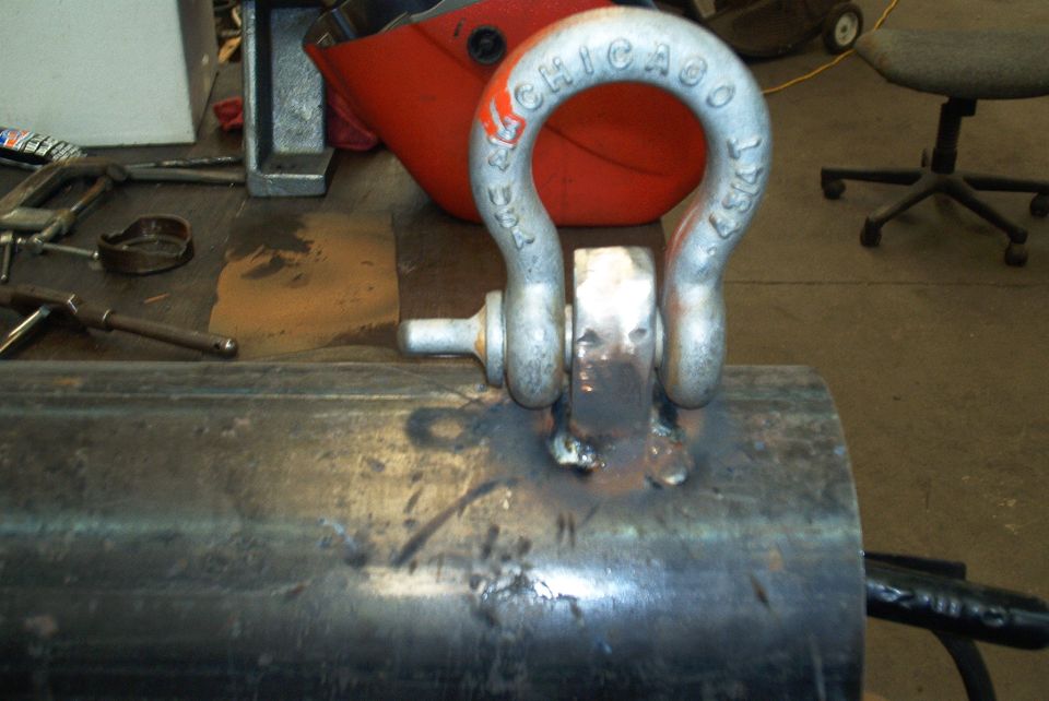 Shackle with 'CHICAGO USA 1987' visible, attached to metal tube