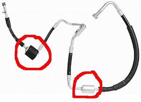 1986 Ford Bronco - AC hoses and filter assembly, with two components circled in red.