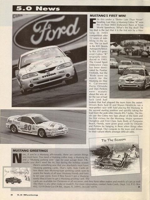 1995 Ford Mustang - Two Ford Mustangs compete in a race, with the foreground car showing the number 20 and sponsor decals.